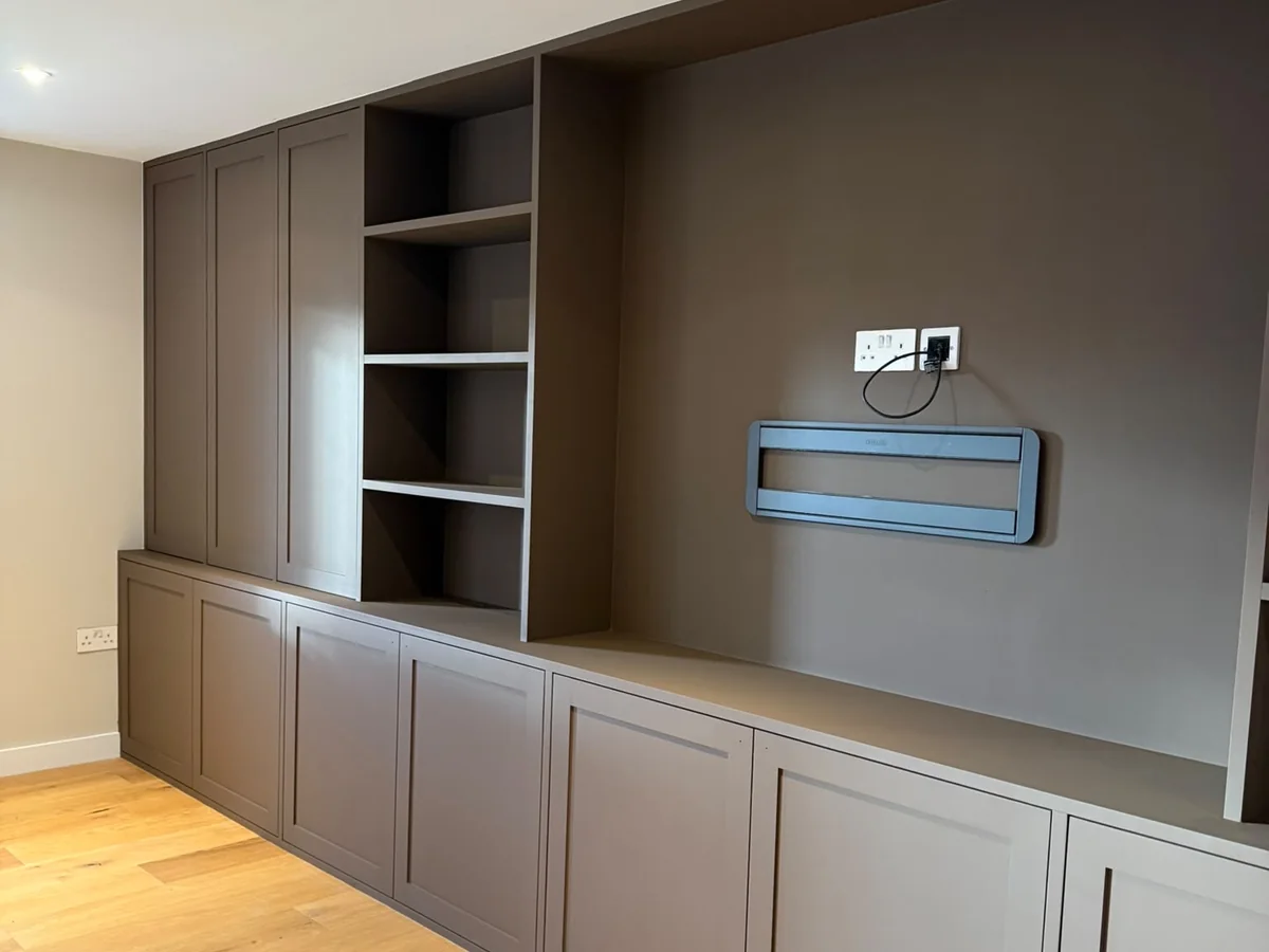 The same media wall after spraying in a deep taupe